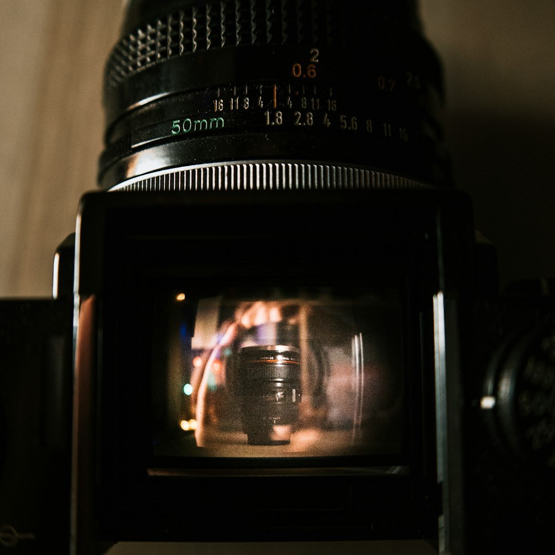 Close-up of a professional video camera lens